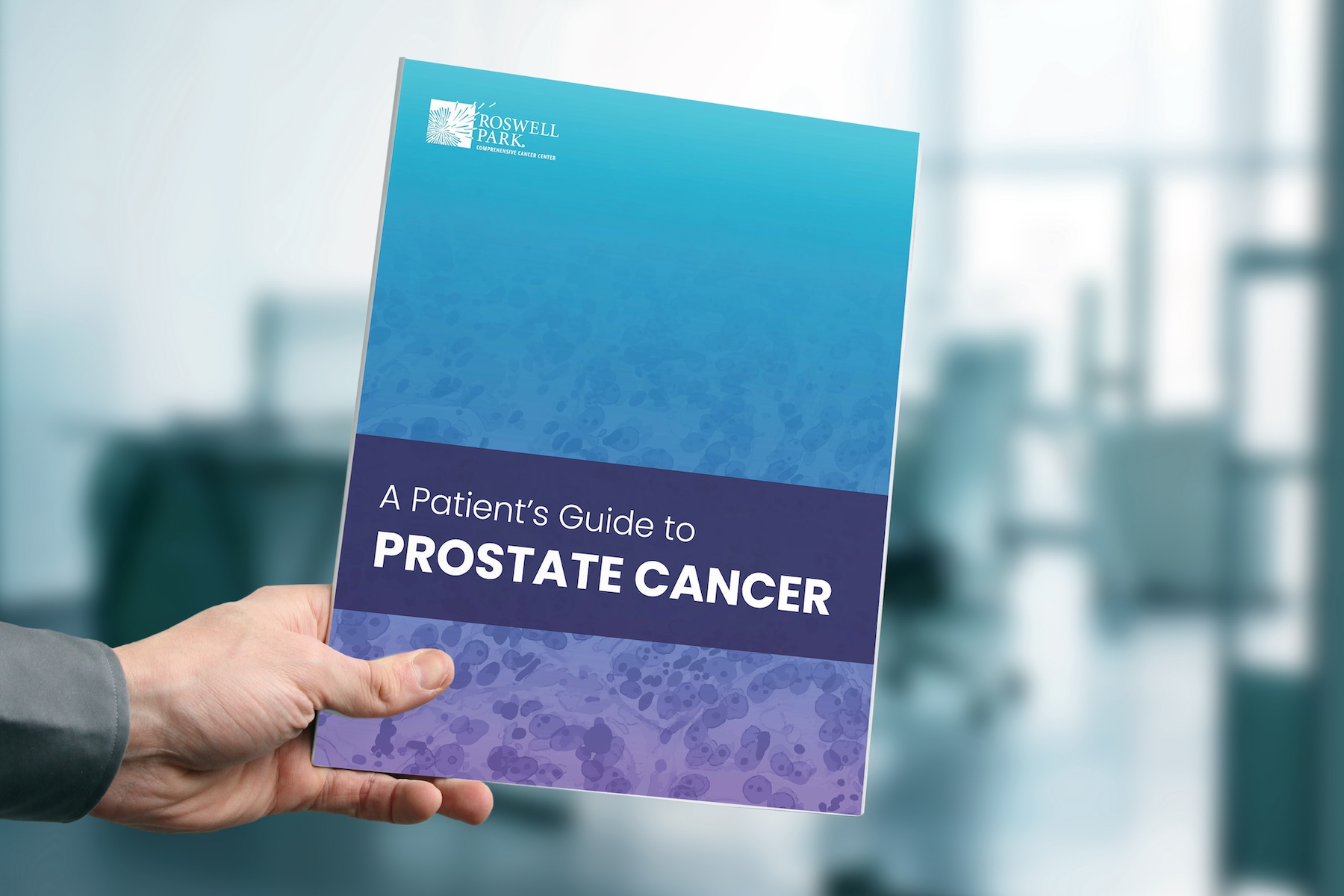 A Patient's Guide to Prostate Cancer Book being held by a hand