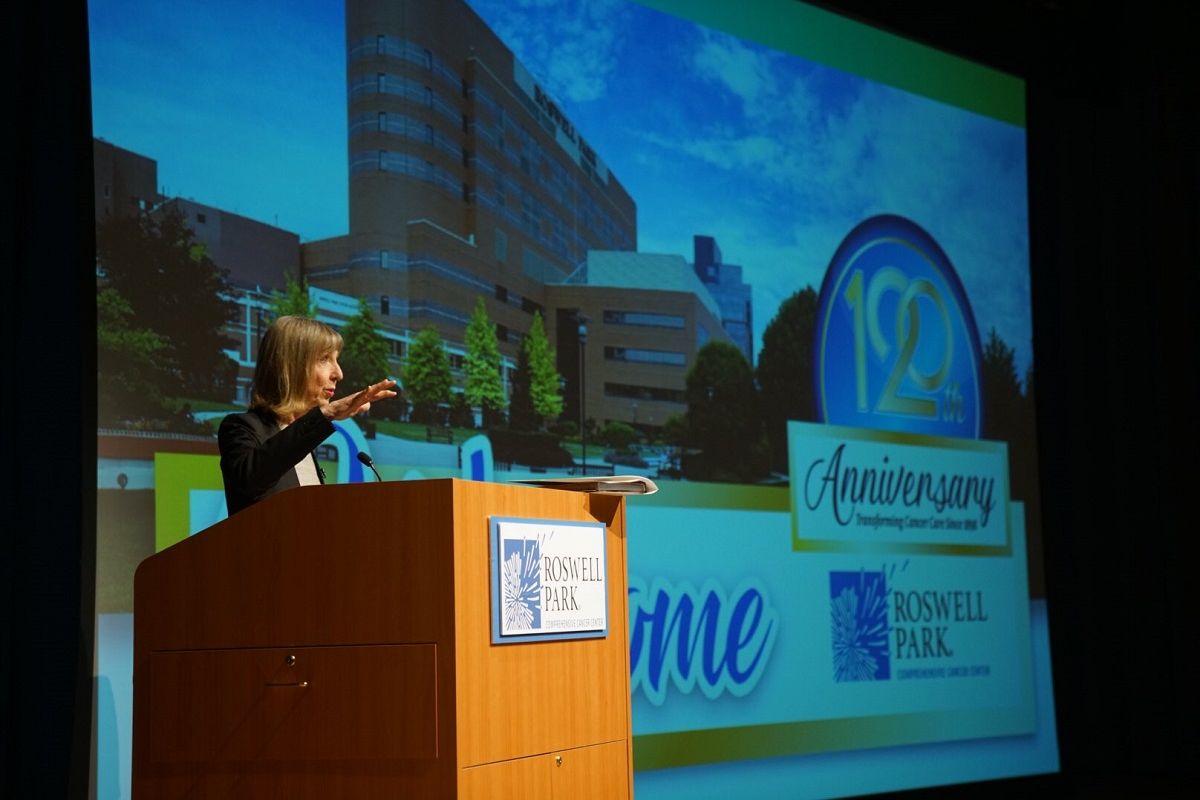 Dr. Johnson Speaking at Podium