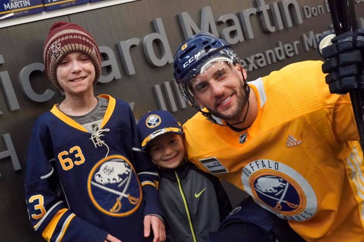 Pediatric patients Emmett and Andre with Marco Scandella