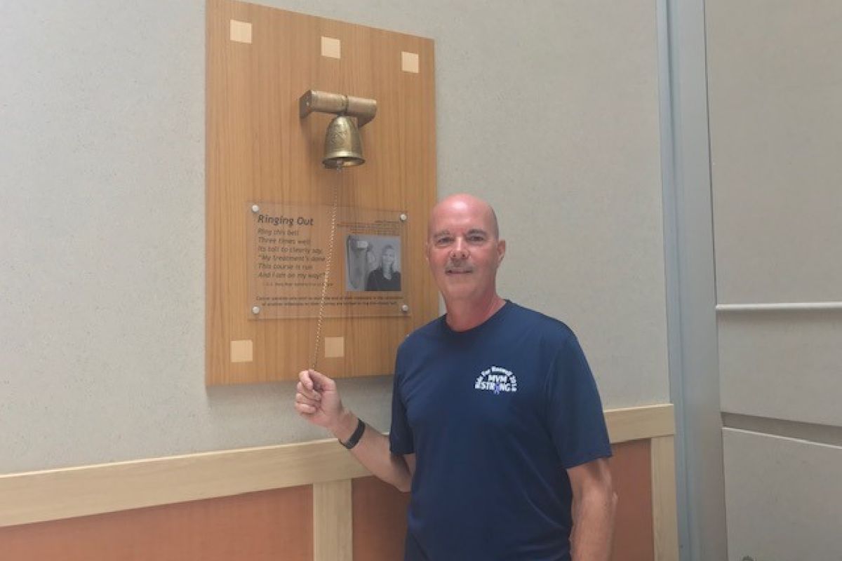 Mark Murdoch ringing the Victory Bell.