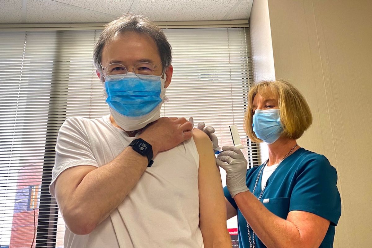 Dr. Phillip McCarthy receives his COVID-19 vaccine.