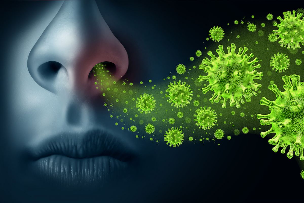 Illustration of germs coming out of a person's nose