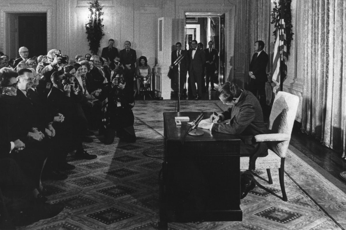 President Richard Nixon signing the National Cancer Act on December 23, 1971.