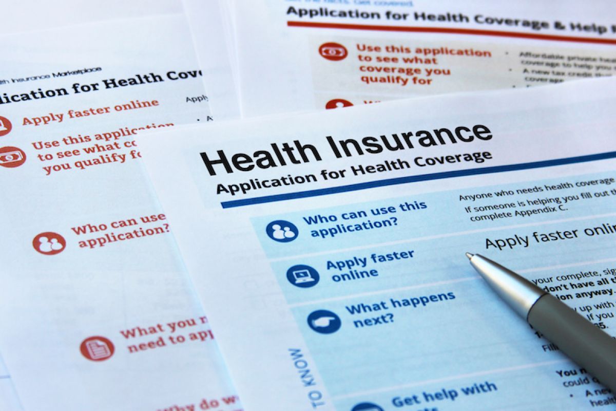 Paperwork titled "health insurance"