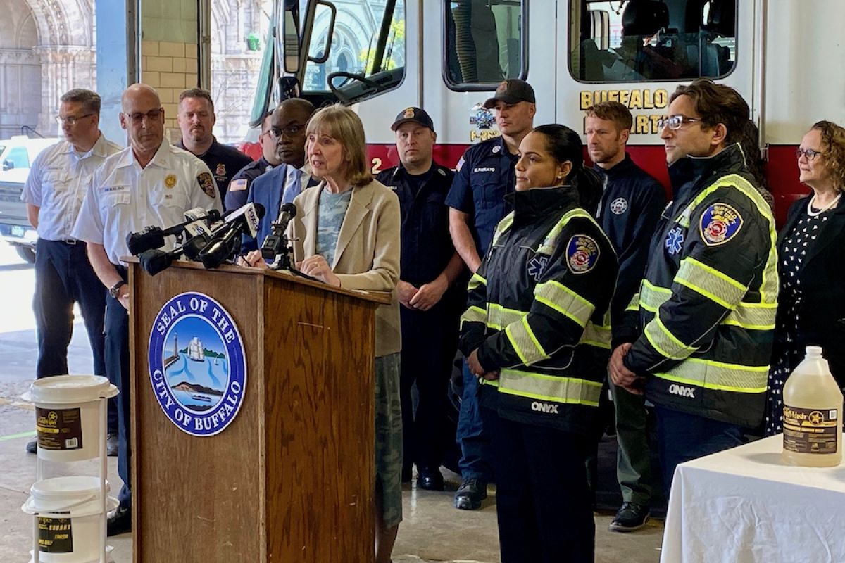 Dr. Johnson speaks at May 2022 press conference with Buffalo mayor and Buffalo Fire Department personnel