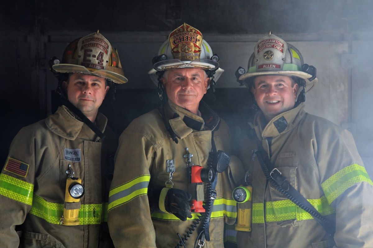 Photo of Richard with his two firefighter sons