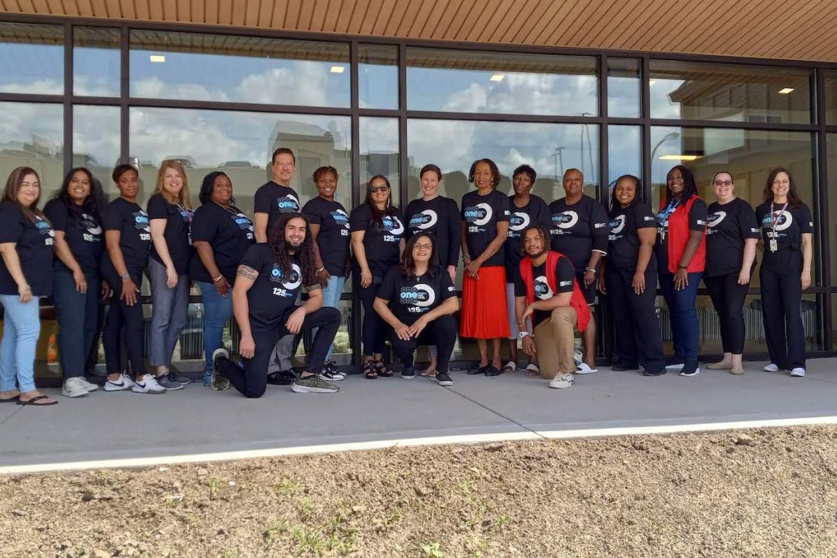 COE Team in front of the new Community Outreach & Engagement Building