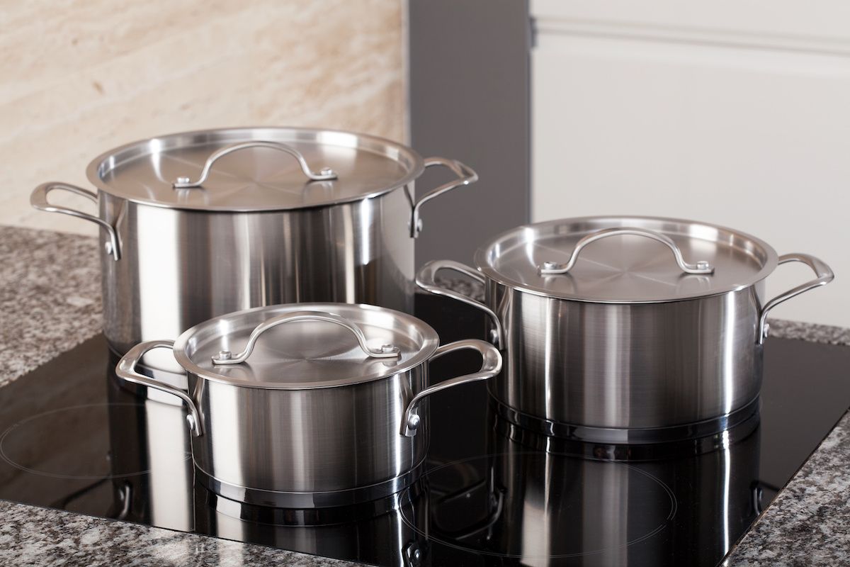 Three stainless steal pots 