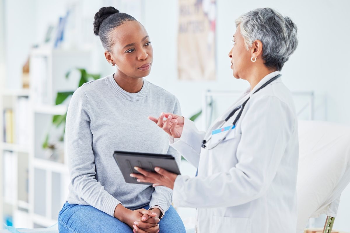 Woman talking to her doctor