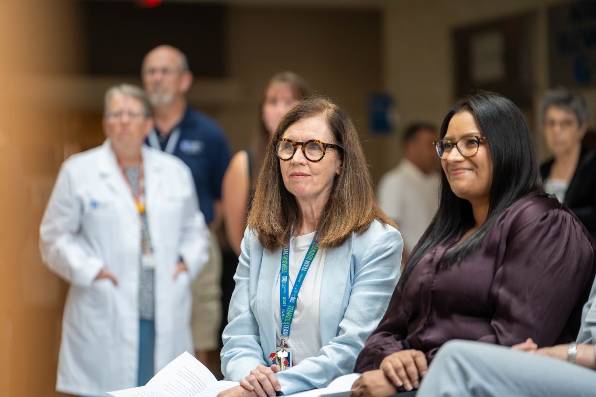 Two doctors in crowd
