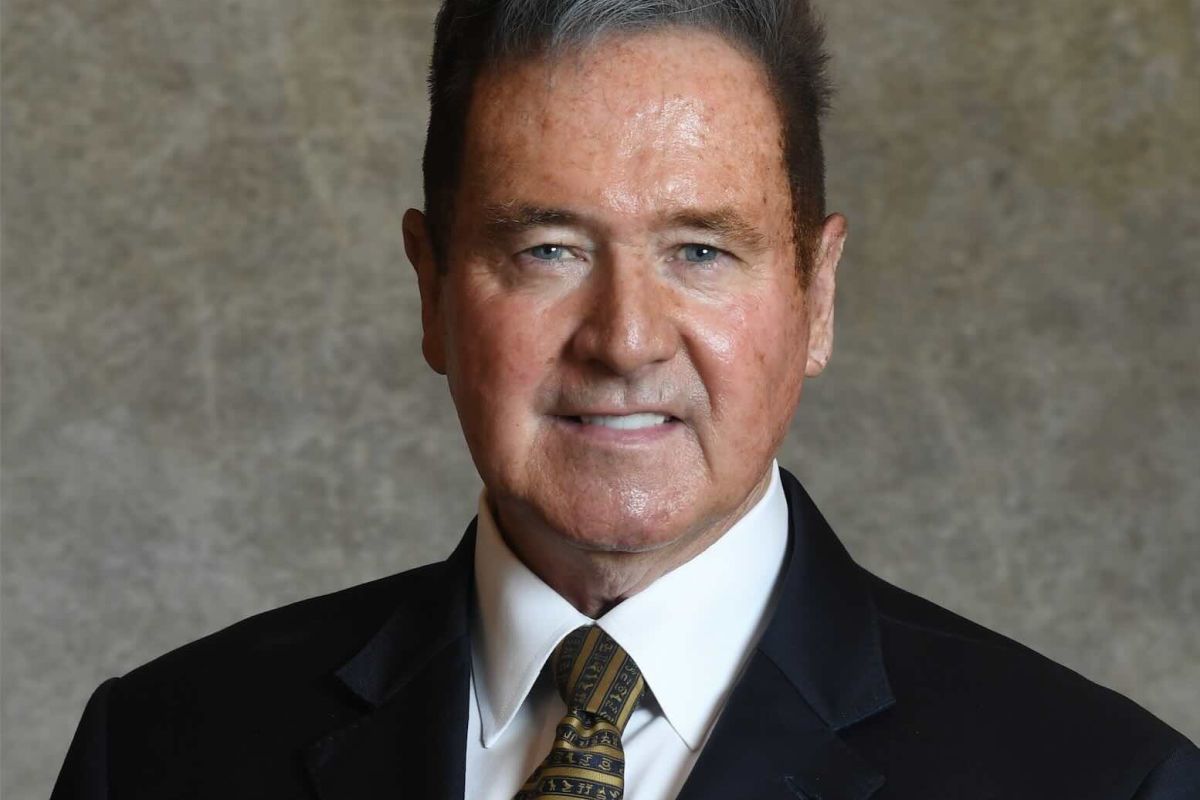Headshot of man in suit