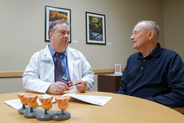 Dr. Kuettel with patient 2019