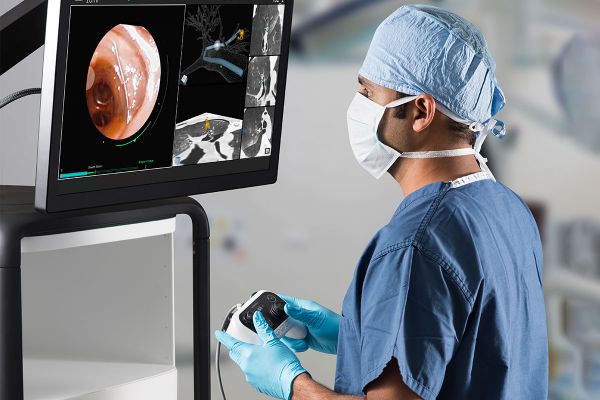 Physician using controller to drive monarch platform