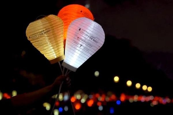 Paper lanterns light up in the dark
