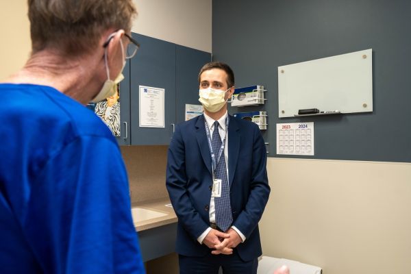 Dr. Leonid Cherkassky consults with a male patient