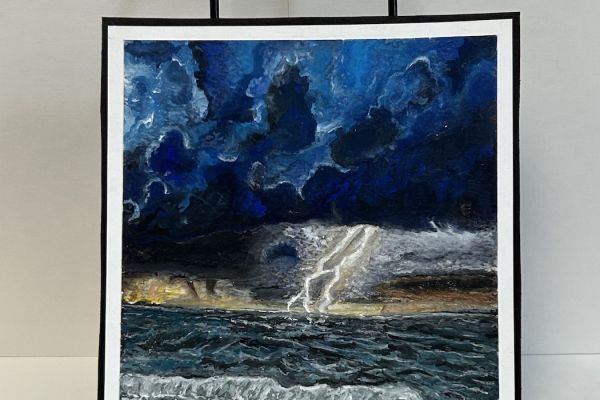 A painting of a lightening bolt over the ocean in the Creative Arts studio to promote services for patients