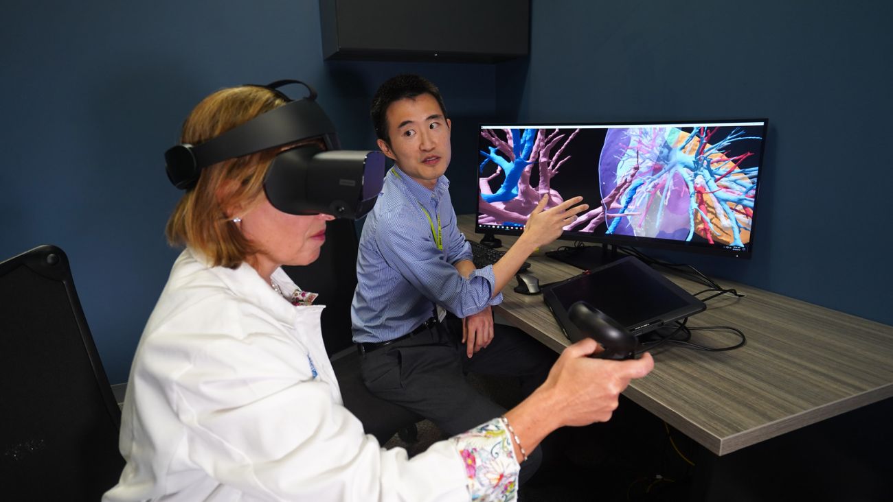 Dr. Larson Hsu shows Dr. Ermelinda Bonaccio how 3-D Imaging can be used to identify the size and shape of tumors.