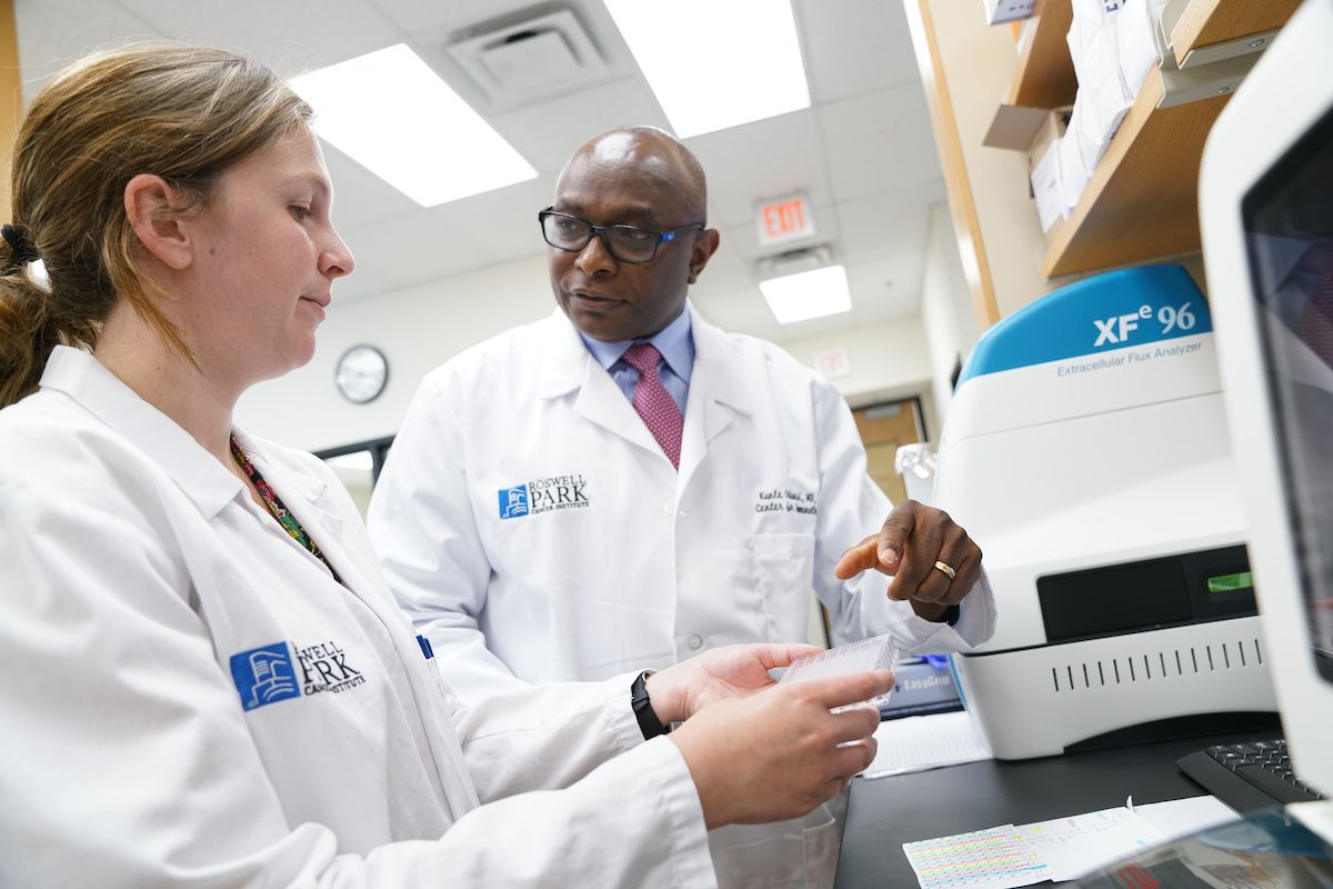 Two people at work in Roswell Park's Center for Immunotherapy