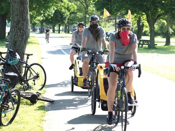 a family ride their bikes in the Ride for Roswell