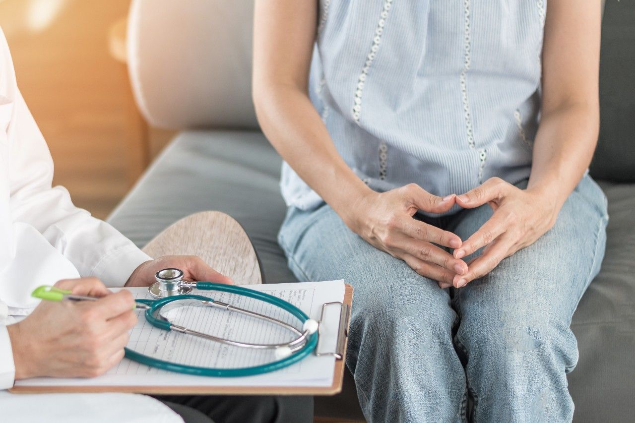 Woman talking to her doctor