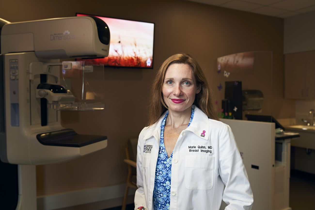 Dr. Quinn near mammogram machine