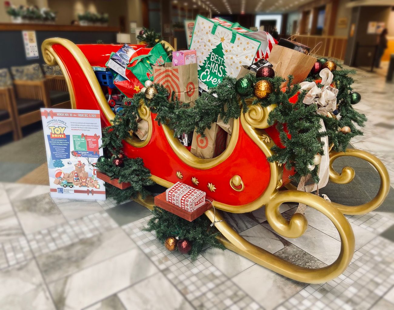 Holiday sleigh filled with donated toys.