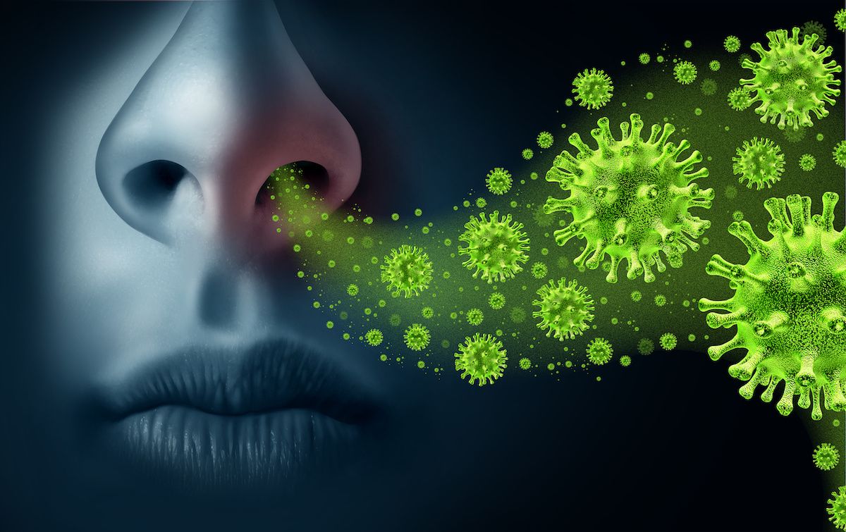 Illustration of germs coming out of a person's nose
