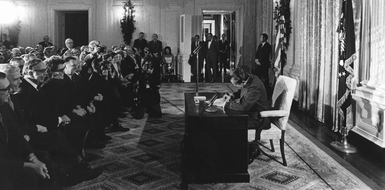 President Richard Nixon signing the National Cancer Act on December 23, 1971.