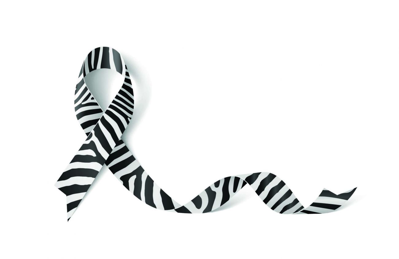 A zebra striped ribbon, signifying Neuroendocrine tumor awareness