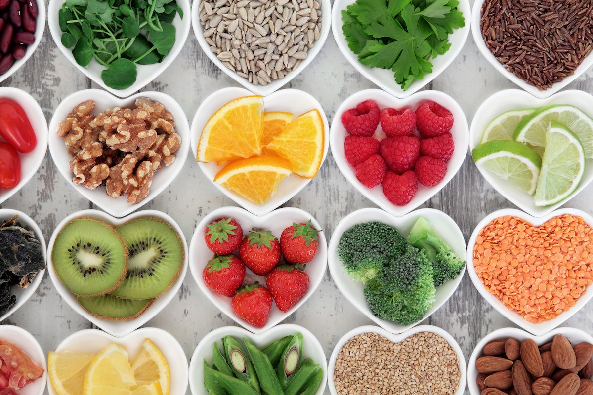 Fruits and vegetables arranged in heart-shaped dishes