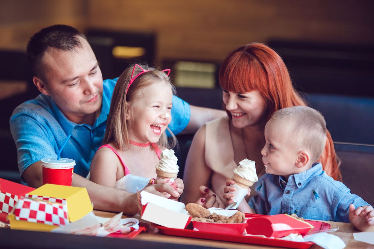 Family eating in fast-food restaurant