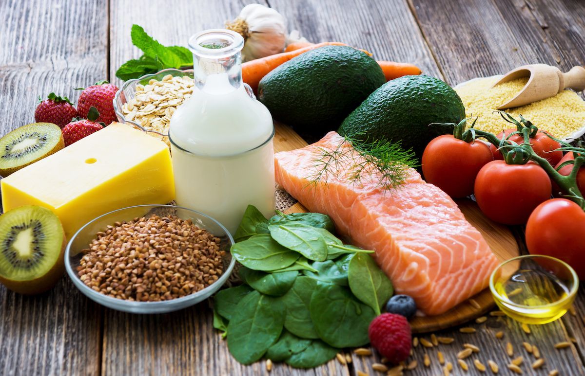 Healthy foods arranged on a wooden table