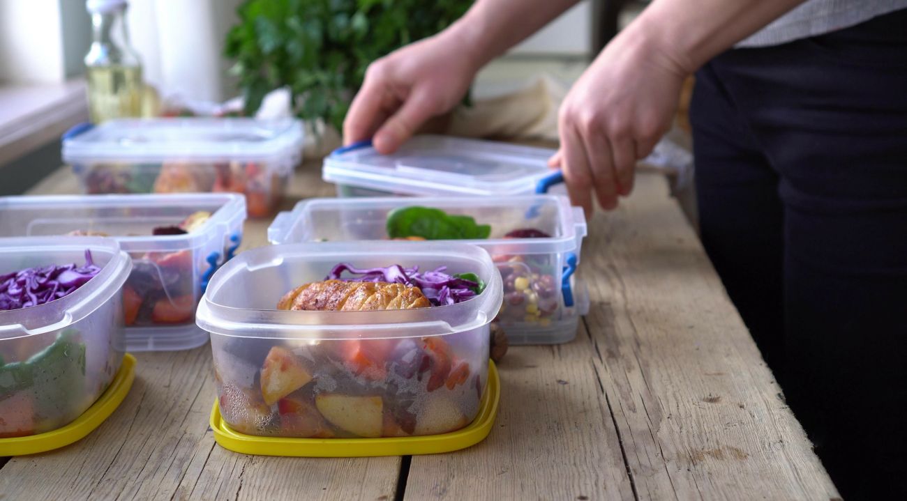 Food is placed in meal prepping containers
