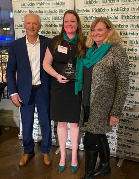 Kathleen Kokolus accepts an award