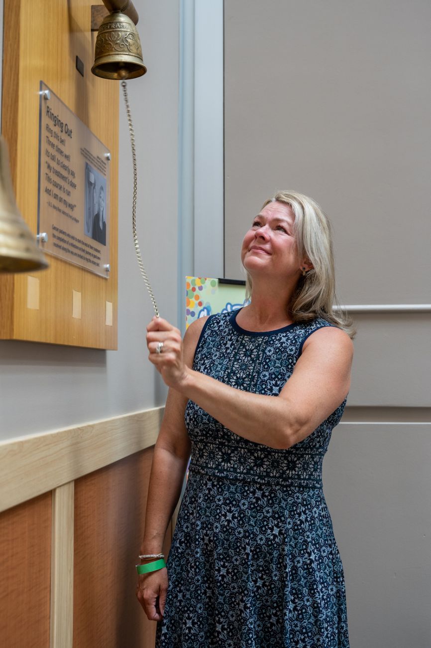 Breast cancer patient Robyn Gilmartin rings the Victory Bell - June 6 2022