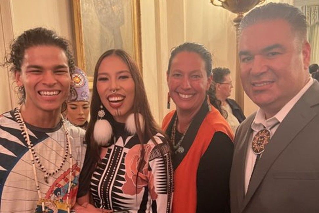 Dr. Rodney Haring, right, stands with three other members of the Indigenous community at the White House. 