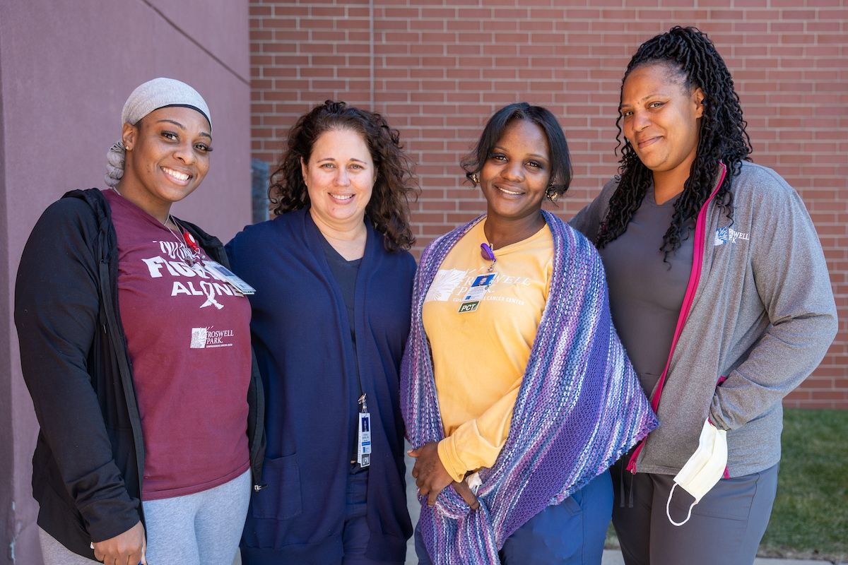 Nurses standing together outdoors