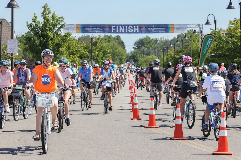 Photo of cyclists crossing Finish Line