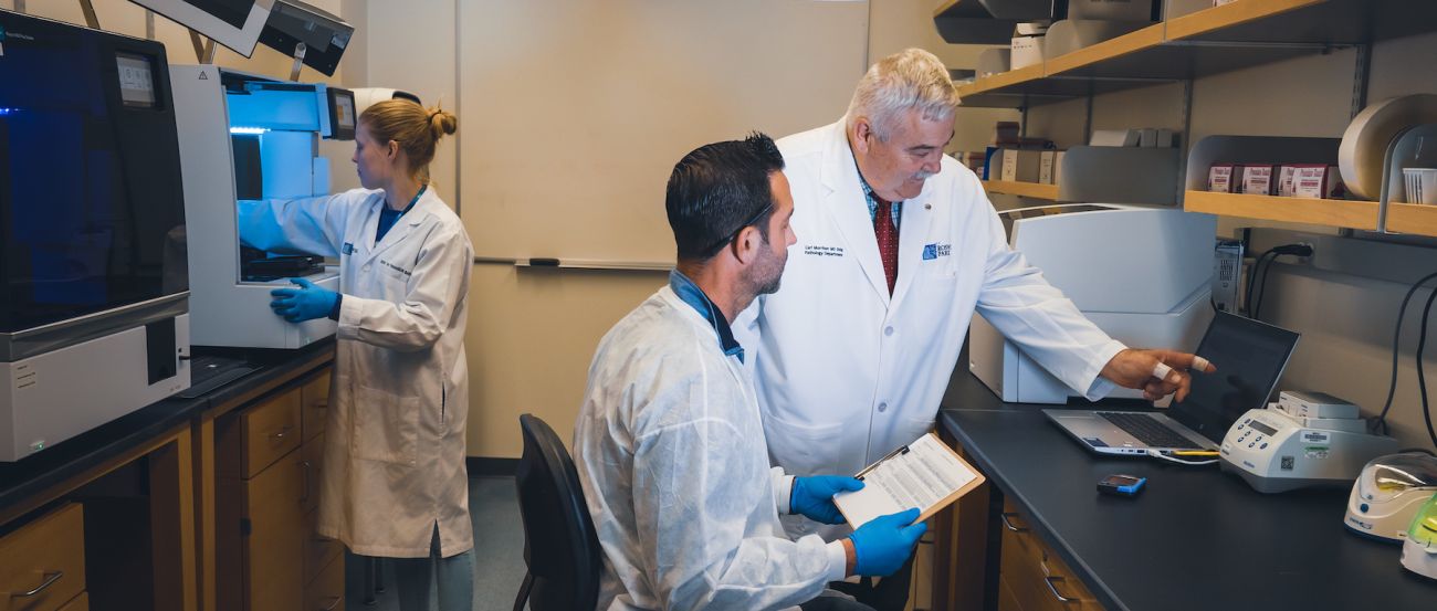 Doctors working in a pathology lab