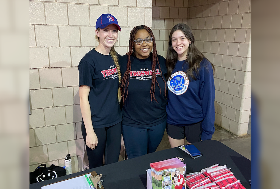 DesTiny Overton poses with fellow YRoswell Street Teamers at an event in the community