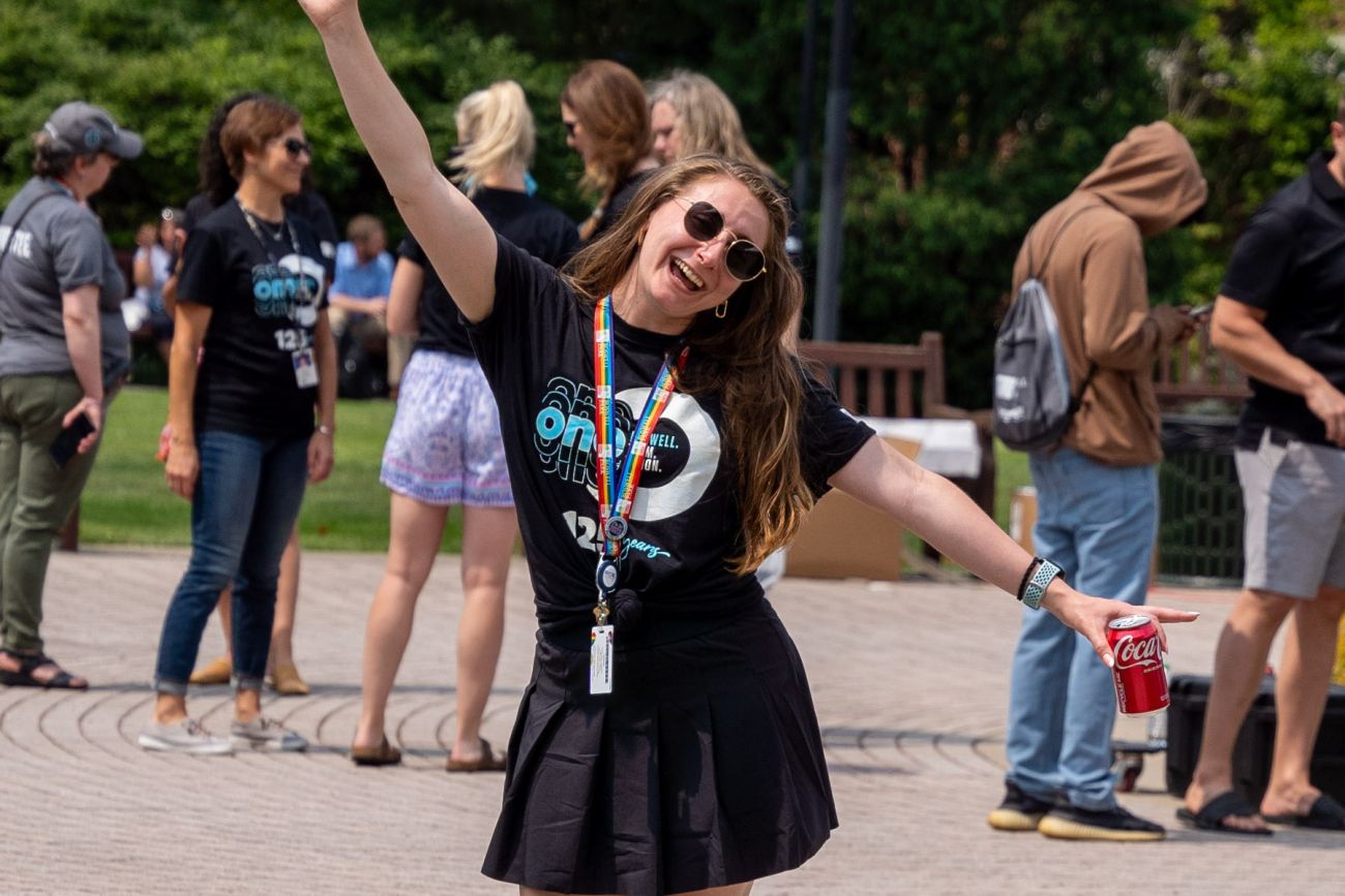 Happy employee waving to the camera