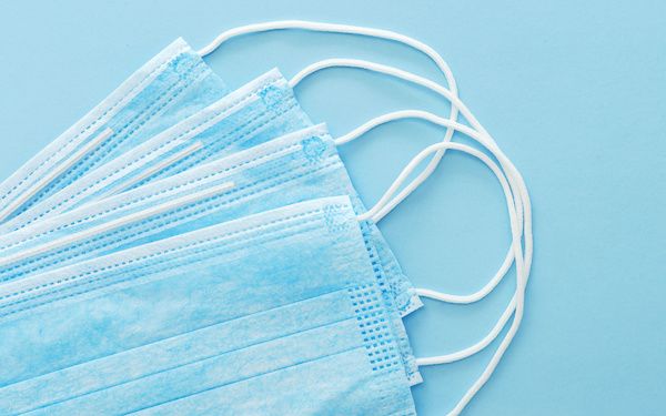 Four blue medical masks 