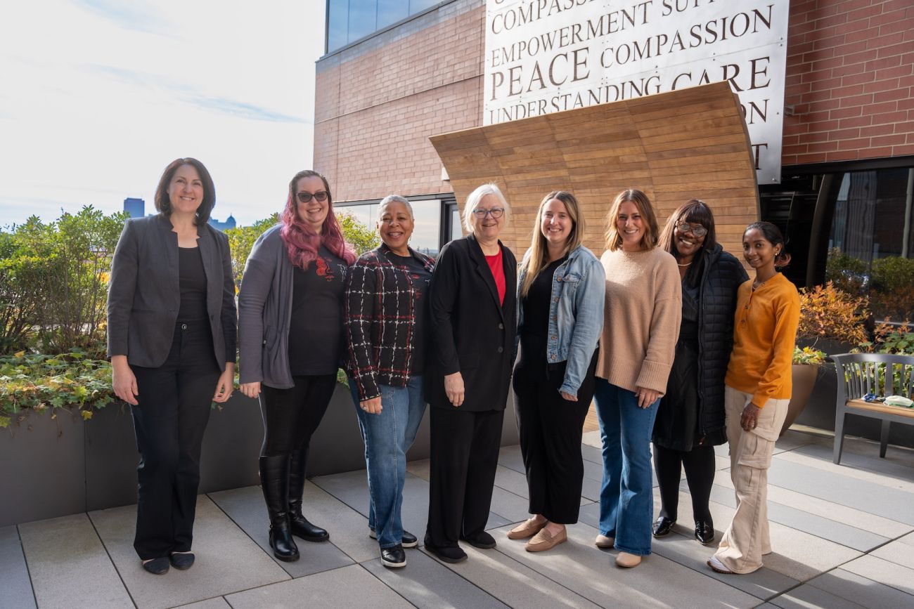 Team of scientists posing outdoors