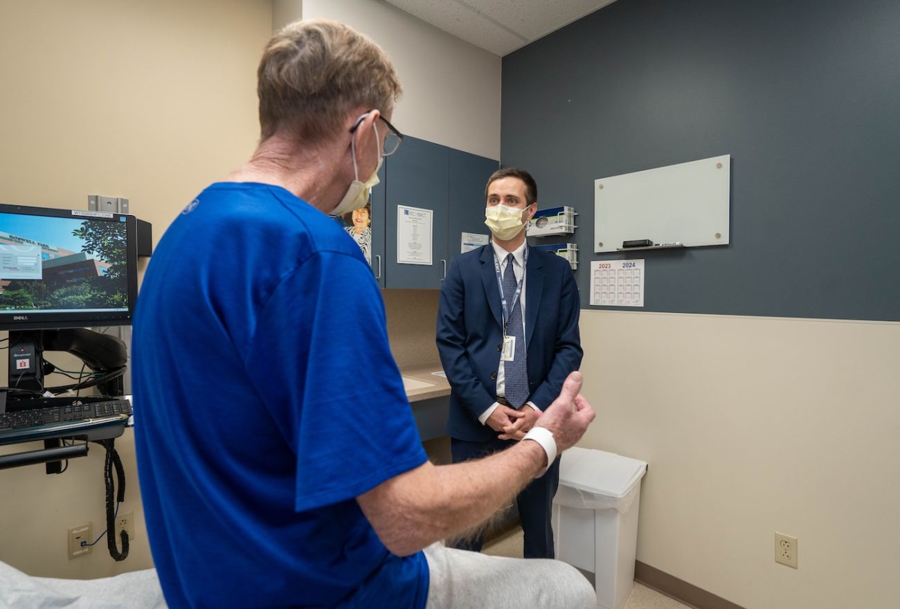 A patient converses with Dr. Leonid Cherkassky in clinic