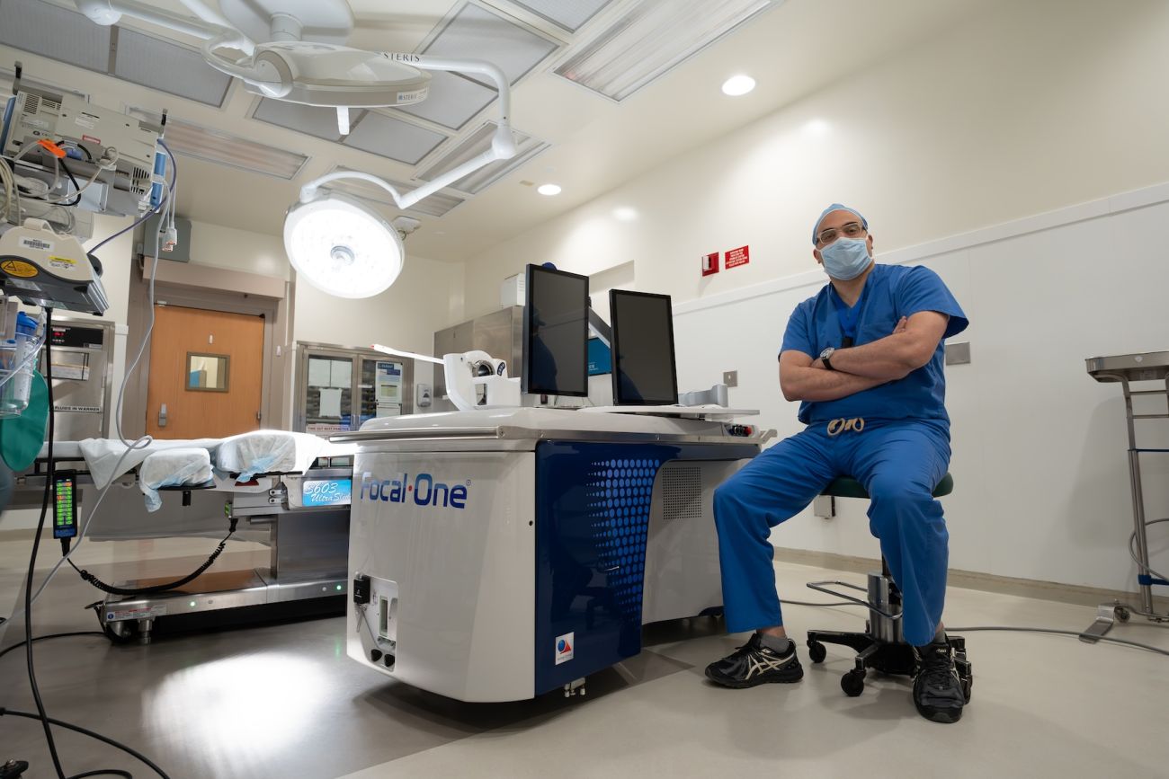 Doctor with the HIFU ultrasound machine in an exam room