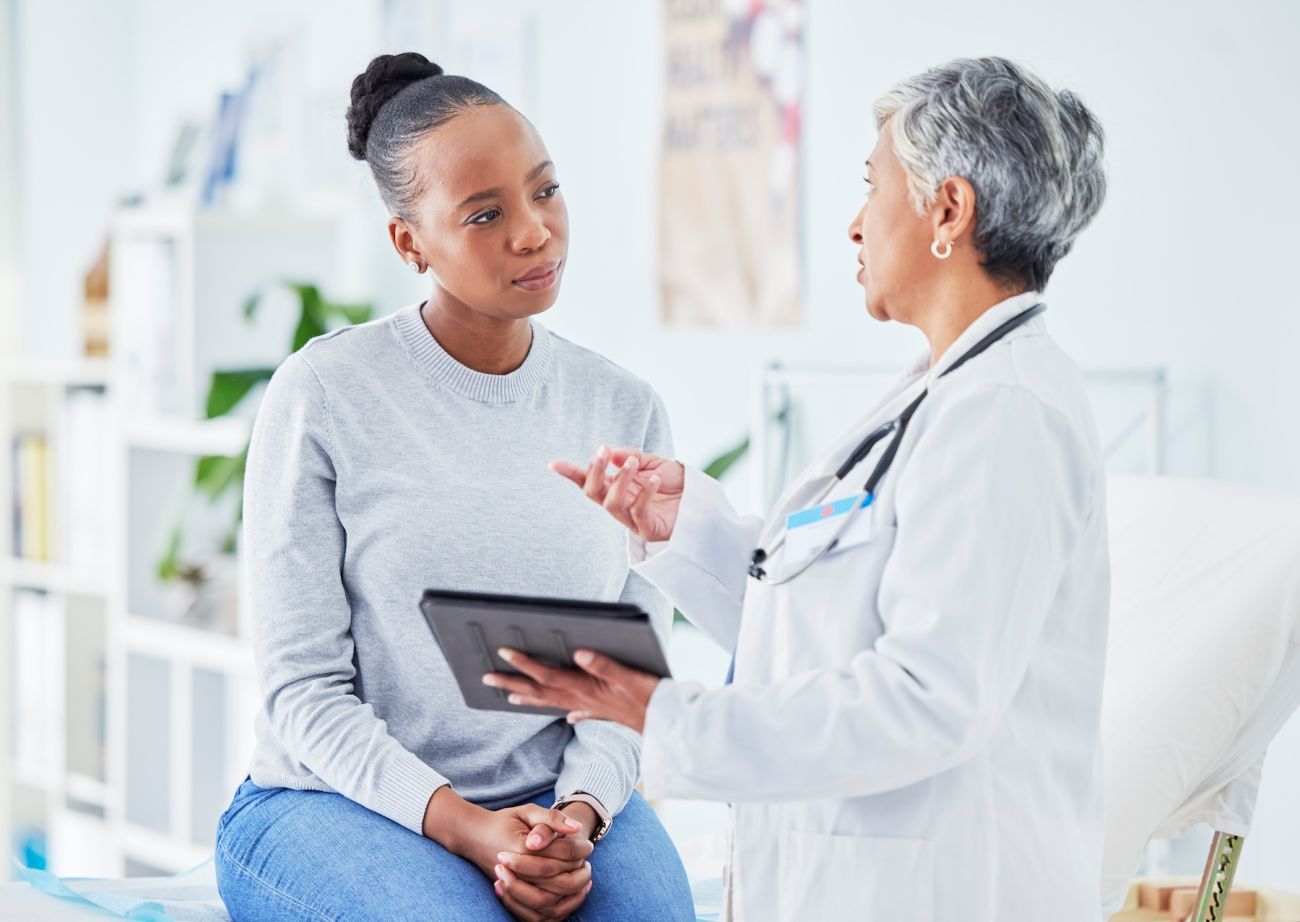 Woman talking to her doctor