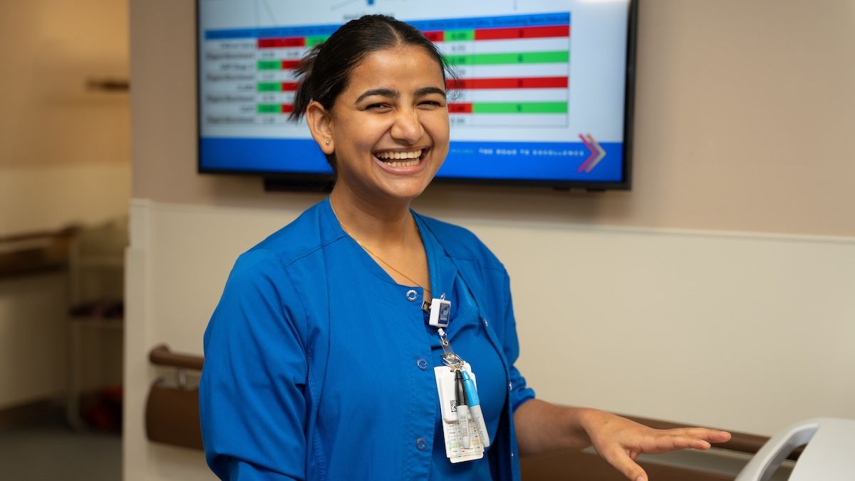 Nurse smiling in a doctor's office