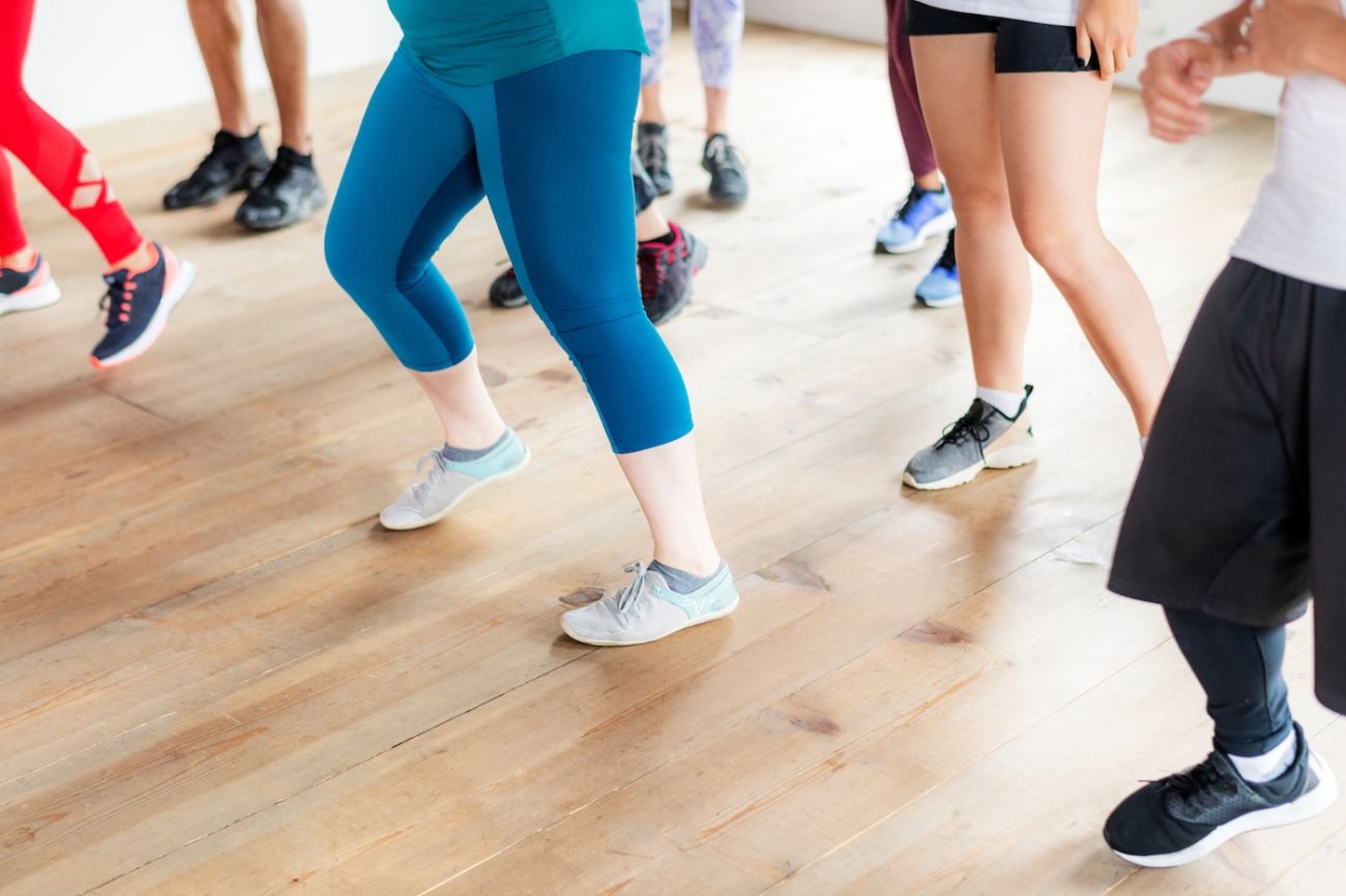 A group of people participating in a cardio class