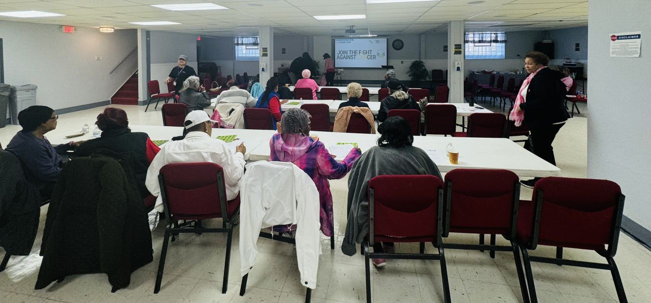 A group of community members attend an I CAN Program workshop
