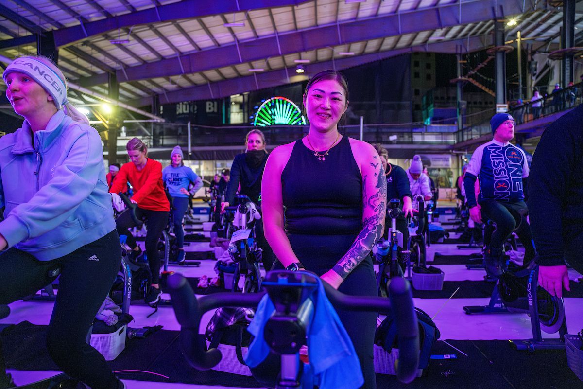 Brain tumor patient Elizabeth Fumia riding at the IceCycle 2025 event